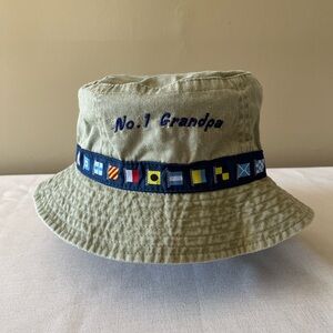 Men’s khaki bucket hat with (No.1 Grandpa) embroidered. Nautical band